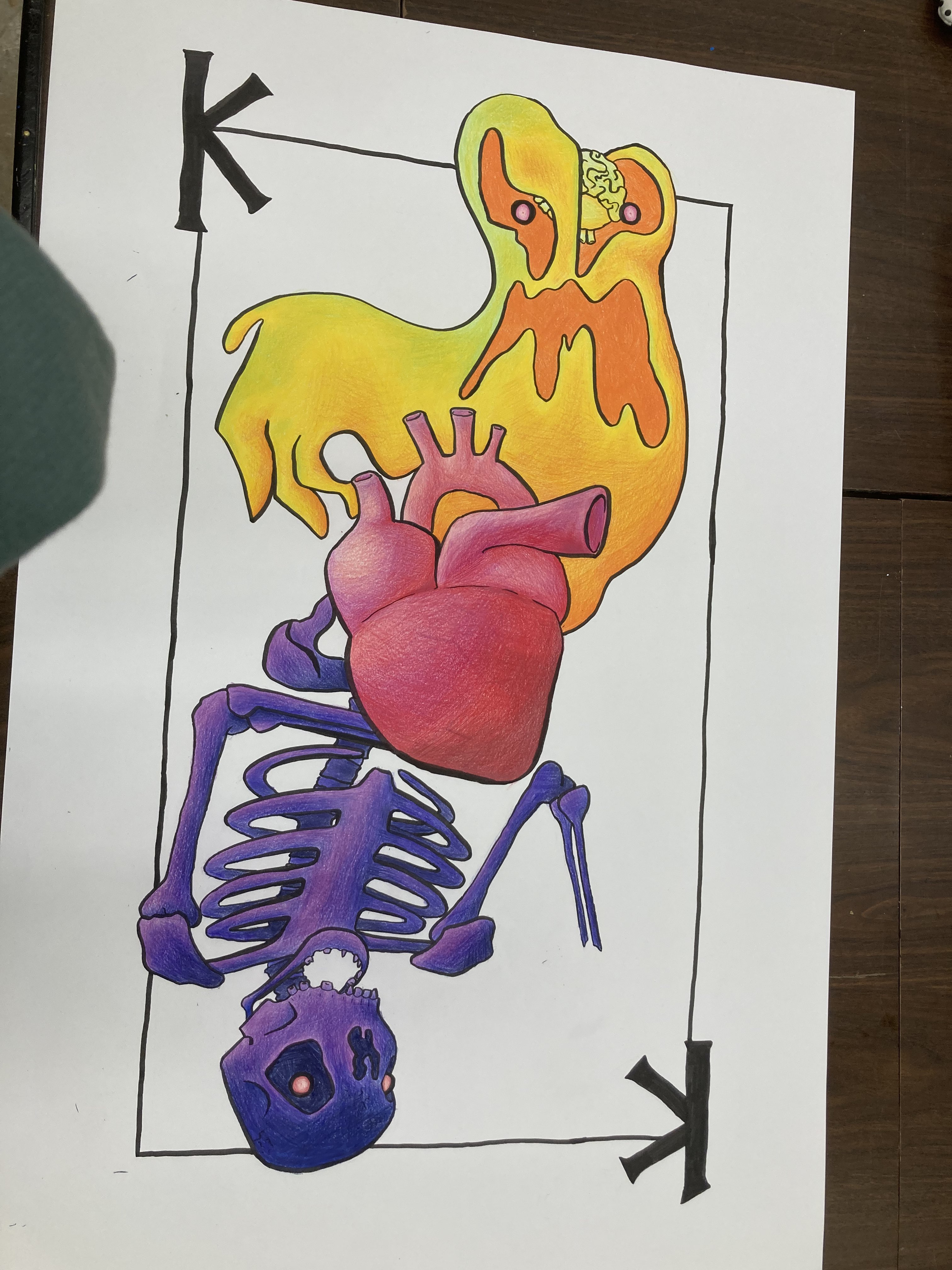 playing card design with blue/purple skeleton and yellow/orange ghost.